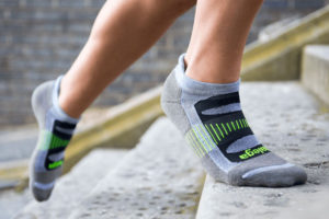 person running in balega socks